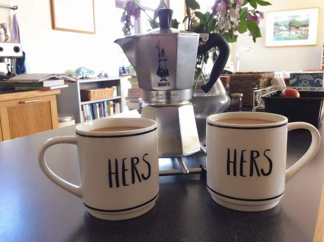 Hers and Hers coffee cups showing the simple pleasures in life.