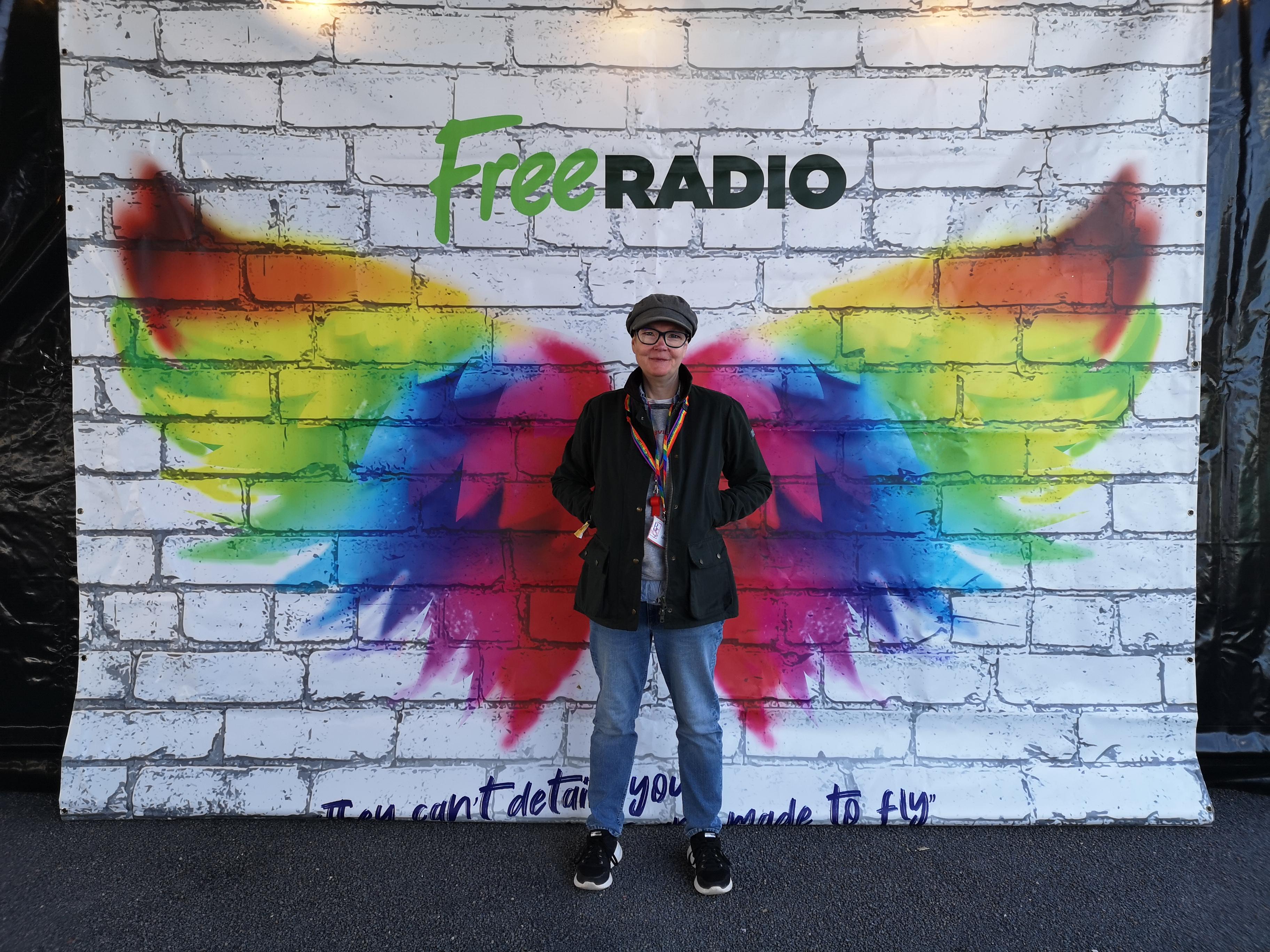 Lesbian romance author Anna Larner earning her rainbow wings at Birmingham Pride 2022