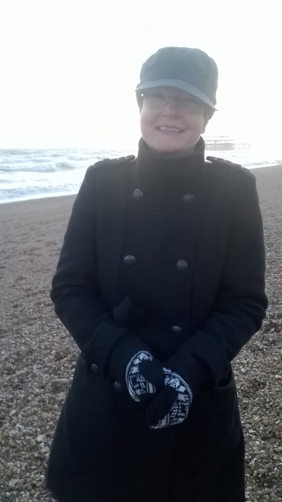 LGBTQ+ Poet and Lesbian Romance Author Anna Larner on Brighton beach during the Lesbian Lives Conference. 